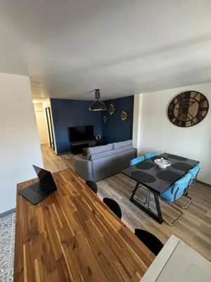Coin salon dans l'établissement Appartement 2 chambres 6 couchages Witry les Reims