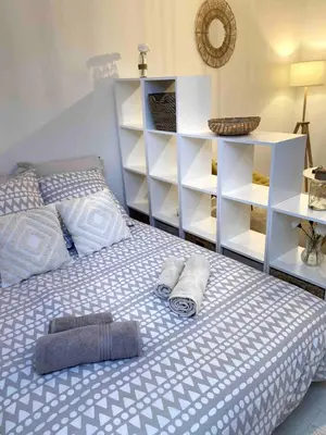 Un ou plusieurs lits dans un hébergement de l'établissement Studio Cosy Centre de Reims