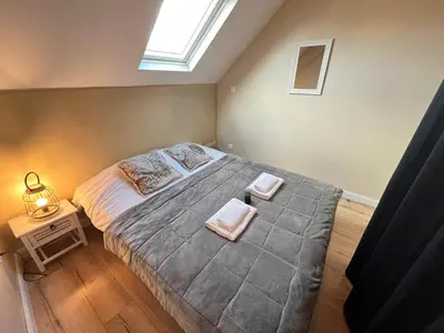 Un ou plusieurs lits dans un hébergement de l'établissement Danton confortable chaleureux proche centre-ville