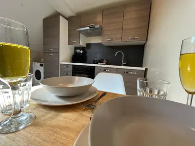 Cuisine ou kitchenette dans l'établissement Danton confortable chaleureux proche centre-ville