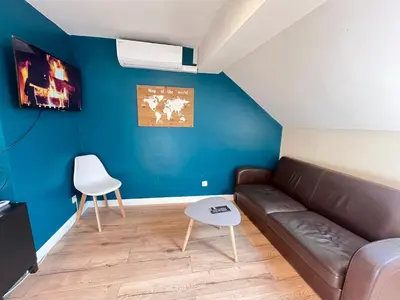 Coin salon dans l'établissement Danton confortable chaleureux proche centre-ville