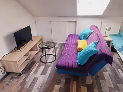 Télévision ou salle de divertissement dans l'établissement Chez Dogoré