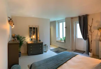 Un ou plusieurs lits dans un hébergement de l'établissement NUANCES Gîte Simplicity and elegance 8-pers