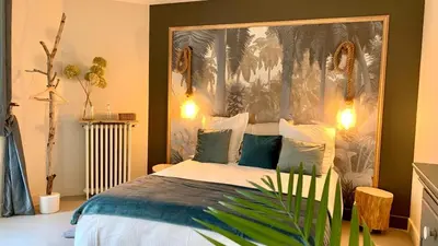 Un ou plusieurs lits dans un hébergement de l'établissement NUANCES Gîte Simplicity and elegance 8-pers