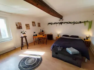 Un ou plusieurs lits dans un hébergement de l'établissement Maison au calme proche A4 Disney Petit déjeuner possible
