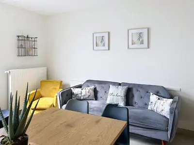 Coin salon dans l'établissement Le Gîte de la Forêt Montmacq
