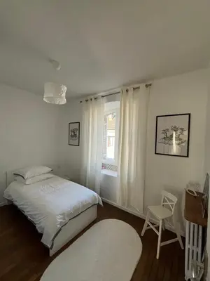 Un ou plusieurs lits dans un hébergement de l'établissement Appartement de la Diane
