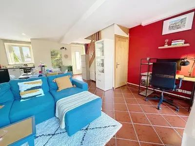 Coin salon dans l'établissement La Maison des Hirondelles