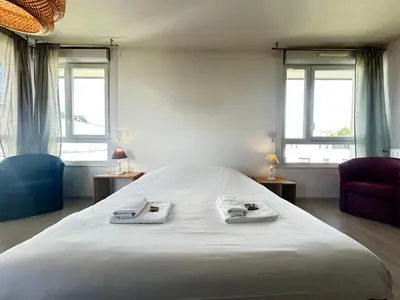 Un ou plusieurs lits dans un hébergement de l'établissement Rooftop 6 pers, 2 Sdb avec terrasse
