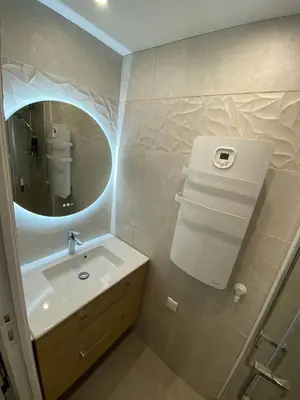 Salle de bains dans l'établissement Le Nid'Ophé Studio Cosy - Proche Disneyland Paris