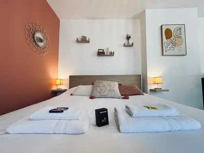 Un ou plusieurs lits dans un hébergement de l'établissement Chez Cath Studio neuf cosy proche centre-ville