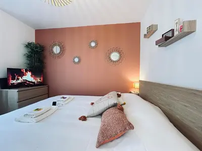 Un ou plusieurs lits dans un hébergement de l'établissement Chez Cath Studio neuf cosy proche centre-ville