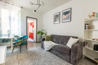 Coin salon dans l'établissement Cozy apartment - Downtown Place d'Erlon