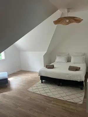 Un ou plusieurs lits dans un hébergement de l'établissement Villa Marine, Jacuzzi, 25' Disneyland