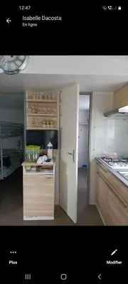 Cuisine ou kitchenette dans l'établissement Mobil-home emplacement 1