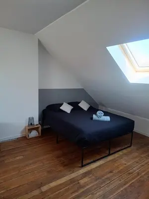 Un ou plusieurs lits dans un hébergement de l'établissement Le GM - appartement proche gare et commerces
