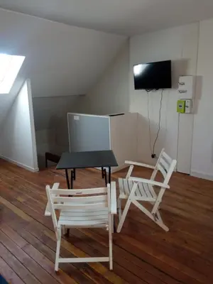 Télévision ou salle de divertissement dans l'établissement Le GM - appartement proche gare et commerces
