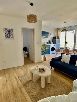 Coin salon dans l'établissement La Grèce - Appartement chaleureux en hypercentre