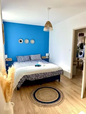 Un ou plusieurs lits dans un hébergement de l'établissement La Grèce - Appartement chaleureux en hypercentre