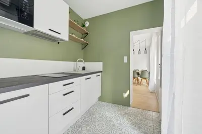 Cuisine ou kitchenette dans l'établissement le SPARN - Votre cocon au coeur d'Epernay
