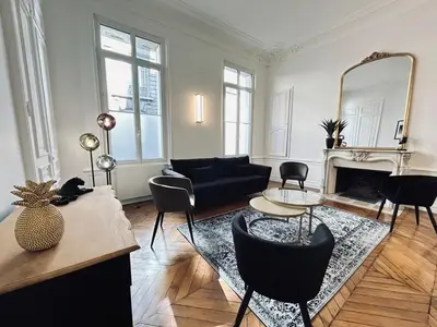 Coin salon dans l'établissement 3 Lenoir Grand T3 luxueux au centre-ville 4 pers
