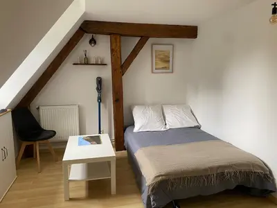 Un ou plusieurs lits dans un hébergement de l'établissement L'écrin des remparts