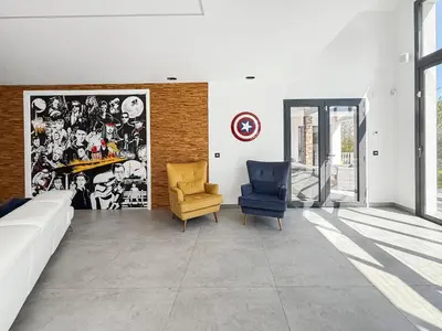 Coin salon dans l'établissement Villa haut de gamme avec Piscine, Bar et Cinéma