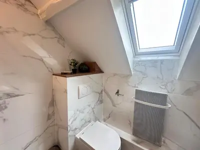 Salle de bains dans l'établissement 2 Carteret studio cosy proche centre ville