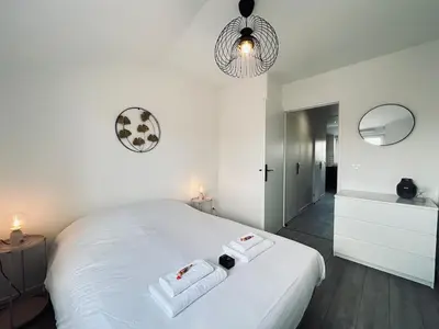 Un ou plusieurs lits dans un hébergement de l'établissement Neufchâtel T3 cocooning tout équipé proche centre