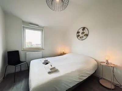 Un ou plusieurs lits dans un hébergement de l'établissement Neufchâtel T3 cocooning tout équipé proche centre