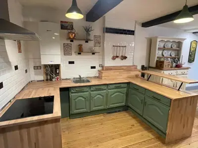 Cuisine ou kitchenette dans l'établissement Les Gîtes de Monthermé Le Duplex avec vue sur la Meuse