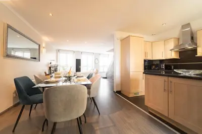 Cuisine ou kitchenette dans l'établissement Duplex avec parking La Parenthèse Pétillante