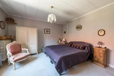 Un ou plusieurs lits dans un hébergement de l'établissement Appartement dans les vignes