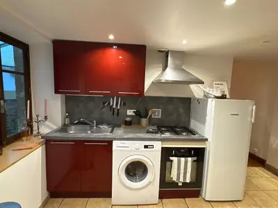 Cuisine ou kitchenette dans l'établissement La maison de Vouziers