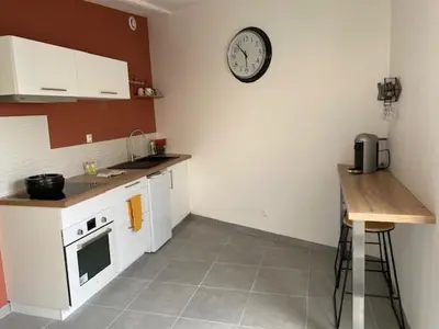 Cuisine ou kitchenette dans l'établissement Autour de la bulle