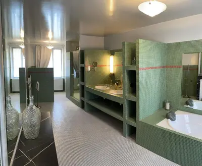 Salle de bains dans l'établissement L'Auberge du Château