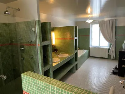 Un ou plusieurs lits dans un hébergement de l'établissement L'Auberge du Château