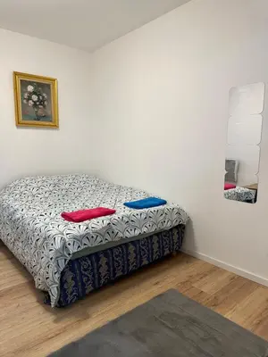Un ou plusieurs lits dans un hébergement de l'établissement La maison du 4