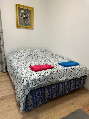 Un ou plusieurs lits dans un hébergement de l'établissement La maison du 4