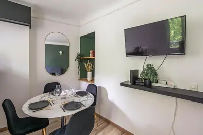 Télévision ou salle de divertissement dans l'établissement Le 1er Général - Center - Free Park