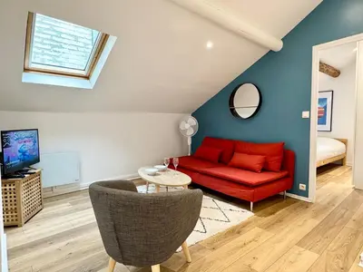 Télévision ou salle de divertissement dans l'établissement Les Arches de Vesle à Reims