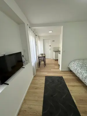 Télévision ou salle de divertissement dans l'établissement Le clos du 4