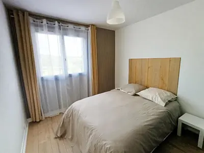 Un ou plusieurs lits dans un hébergement de l'établissement Appartement 3 chambres à Sedan