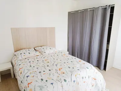 Un ou plusieurs lits dans un hébergement de l'établissement Appartement 3 chambres à Sedan