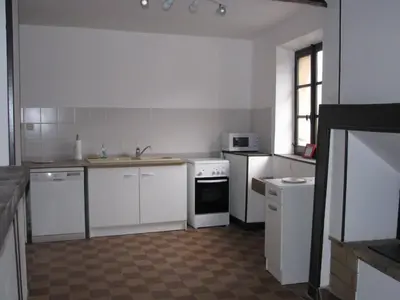Cuisine ou kitchenette dans l'établissement Ferme Des Chapelles