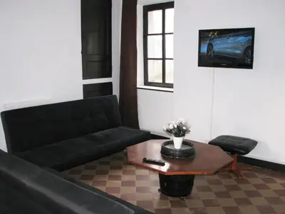 Coin salon dans l'établissement Ferme Des Chapelles