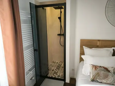 Un ou plusieurs lits dans un hébergement de l'établissement Gîte Champagne Philippe Moutardier - Chambre Arôme