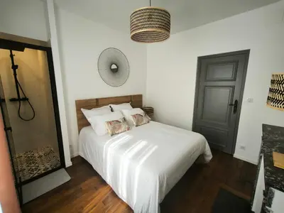 Un ou plusieurs lits dans un hébergement de l'établissement Gîte Champagne Philippe Moutardier - Chambre Arôme