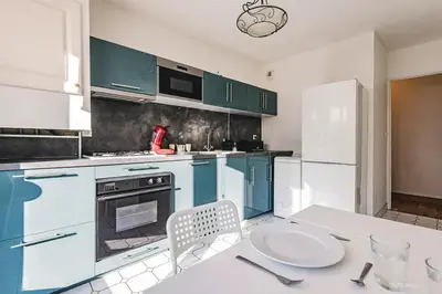 Cuisine ou kitchenette dans l'établissement Terrasse & Bulles - Grand T3 au cœur de Reims