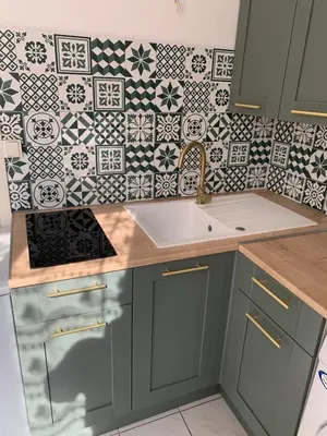 Cuisine ou kitchenette dans l'établissement Jolie studio meublé tout équipé
